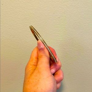 Michael Kors gold toned bangle bracelet with crystal